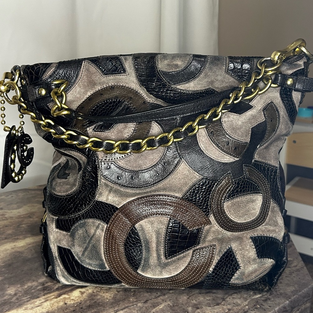 SOLD.    Coach Black and Brown Tote with Gold Accents